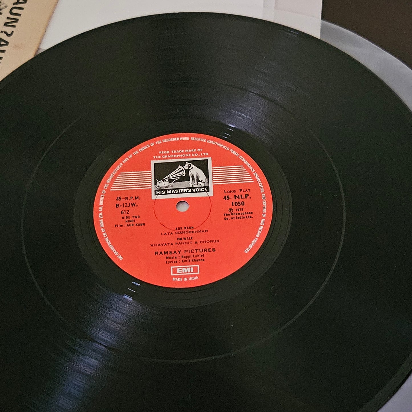 AUR KAUN"- featuring hit kishore song "HAAN PAHLI BAAR" in Excellent condition - Music by Bappi Lahiri