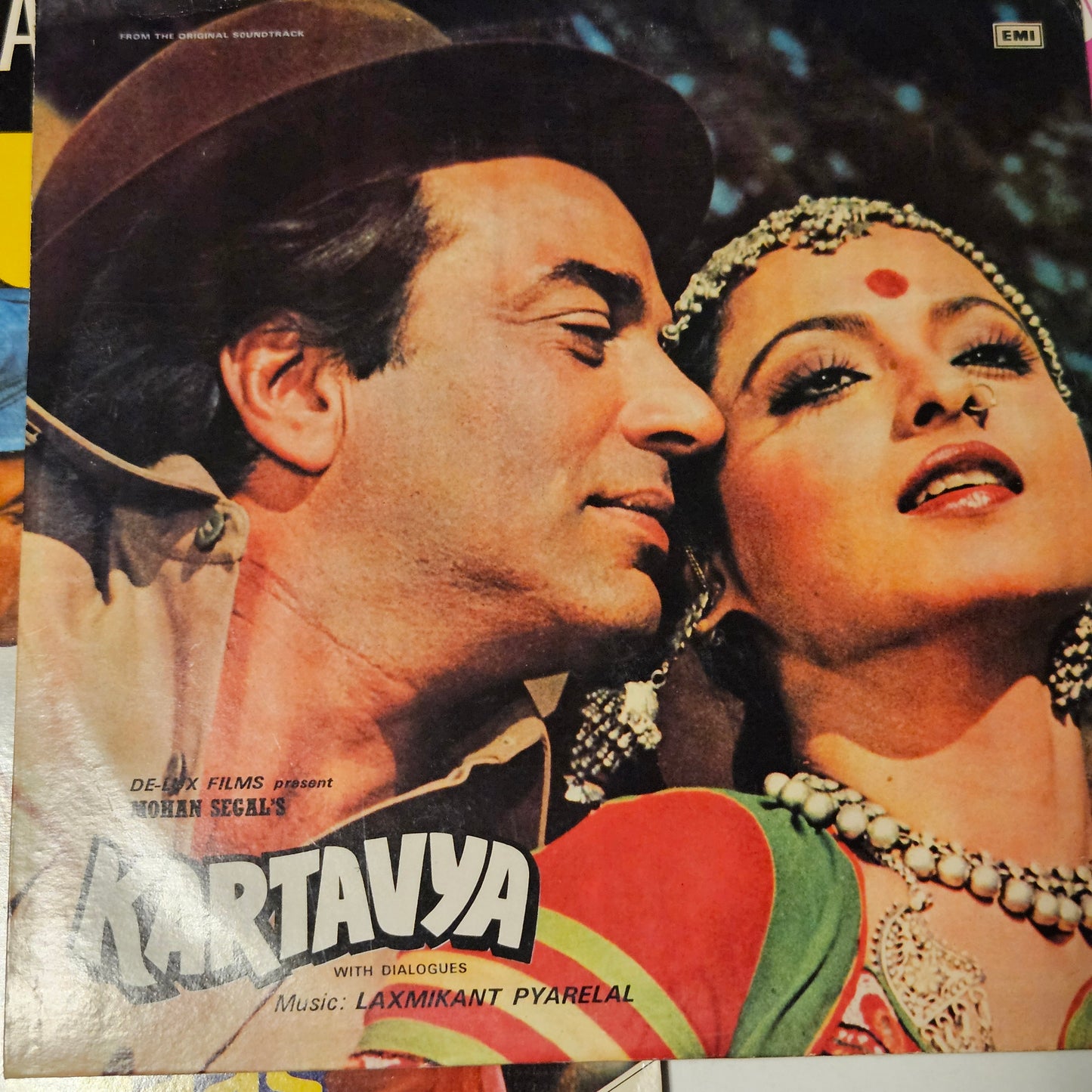 4 LPs Dharmendra's films and Laxmikant Pyarelal Superhit Aas Paas, Kartavya, Aya Sawan Jhoom ke, and Mere Hamdam Mere Dost in excellent condition