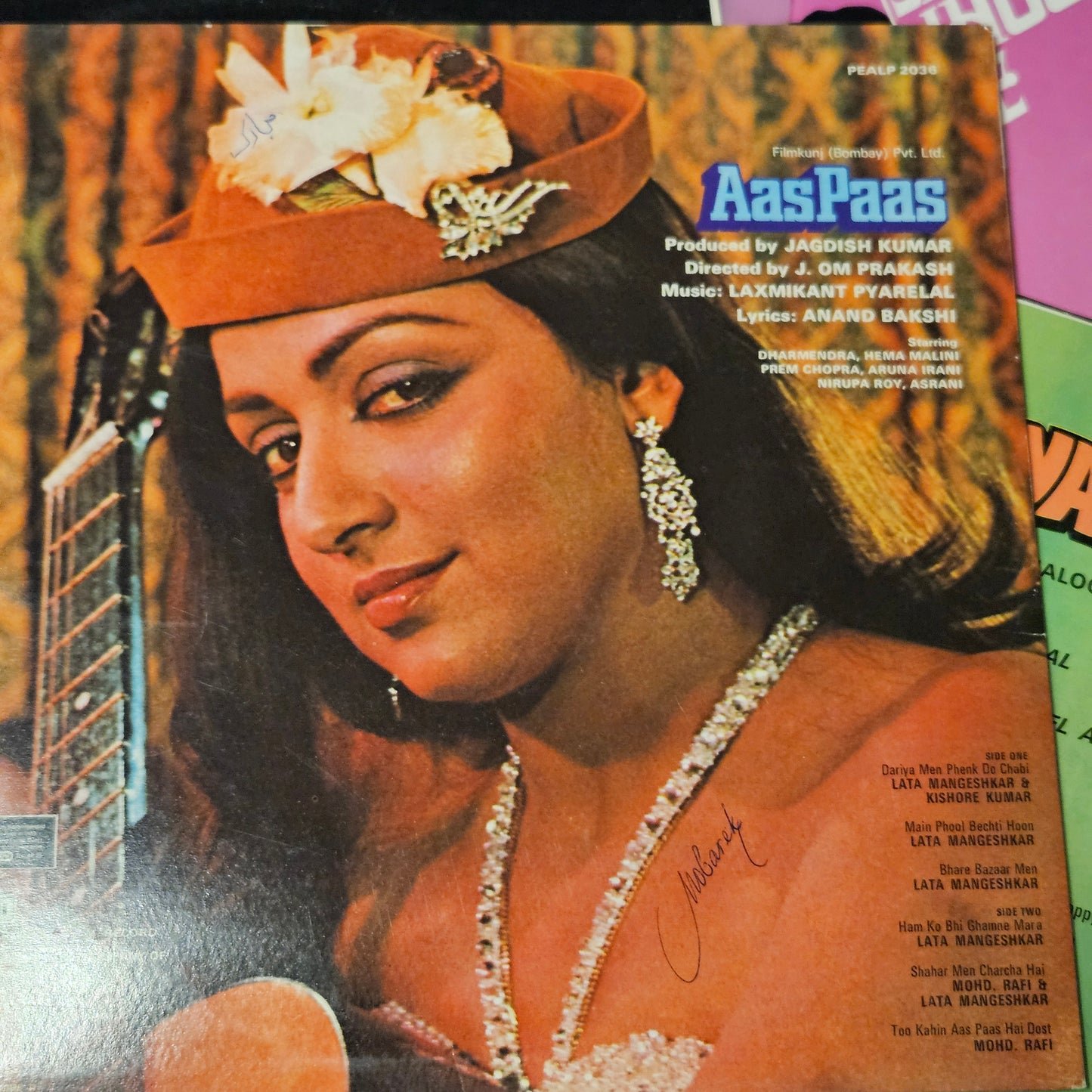 4 LPs Dharmendra's films and Laxmikant Pyarelal Superhit Aas Paas, Kartavya, Aya Sawan Jhoom ke, and Mere Hamdam Mere Dost in excellent condition