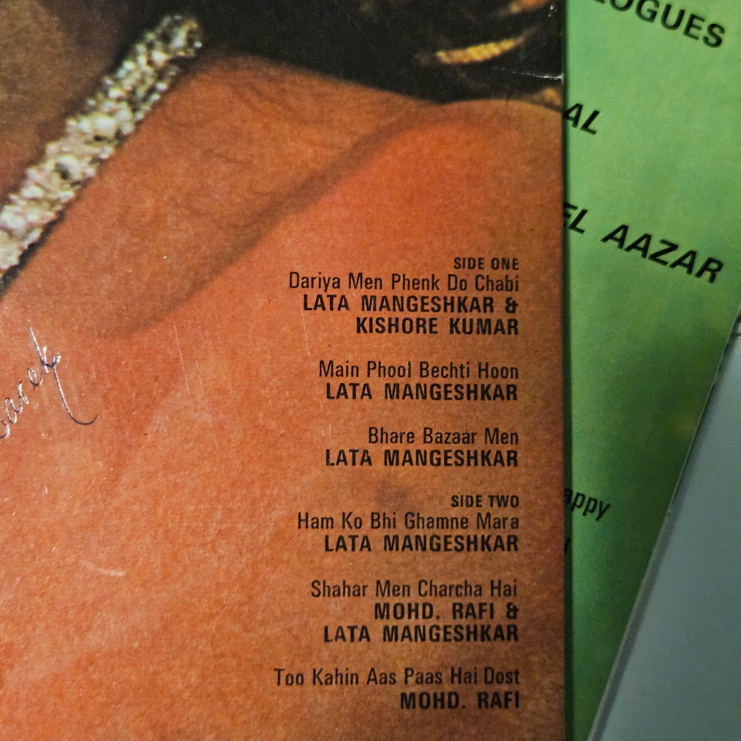 4 LPs Dharmendra's films and Laxmikant Pyarelal Superhit Aas Paas, Kartavya, Aya Sawan Jhoom ke, and Mere Hamdam Mere Dost in excellent condition