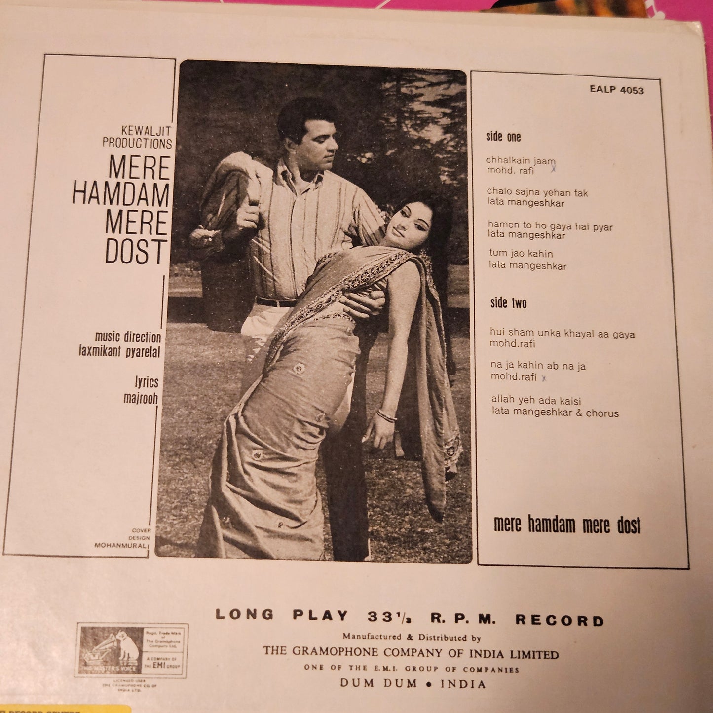 4 LPs Dharmendra's films and Laxmikant Pyarelal Superhit Aas Paas, Kartavya, Aya Sawan Jhoom ke, and Mere Hamdam Mere Dost in excellent condition
