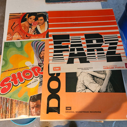 4 Lps of music by Laxmikant Pyarelal Superhit collection 1.Dosti 2.Shor 3. Farz and 4. Suraj aur Chanda all in near mint condition - original soundtrack - great deal
