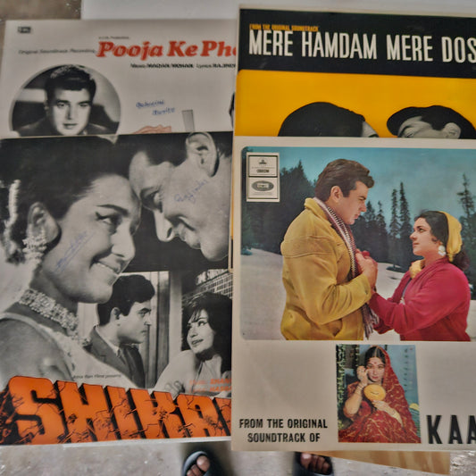 4 LPs of Dharmendra's superhit  films in excellent condition - Pooja ke Phool, Shikar, Mere Hamdam mere Dost and Kaajal